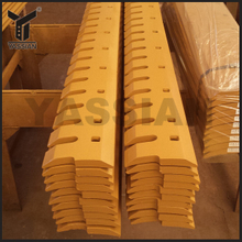 Serrated grader blades